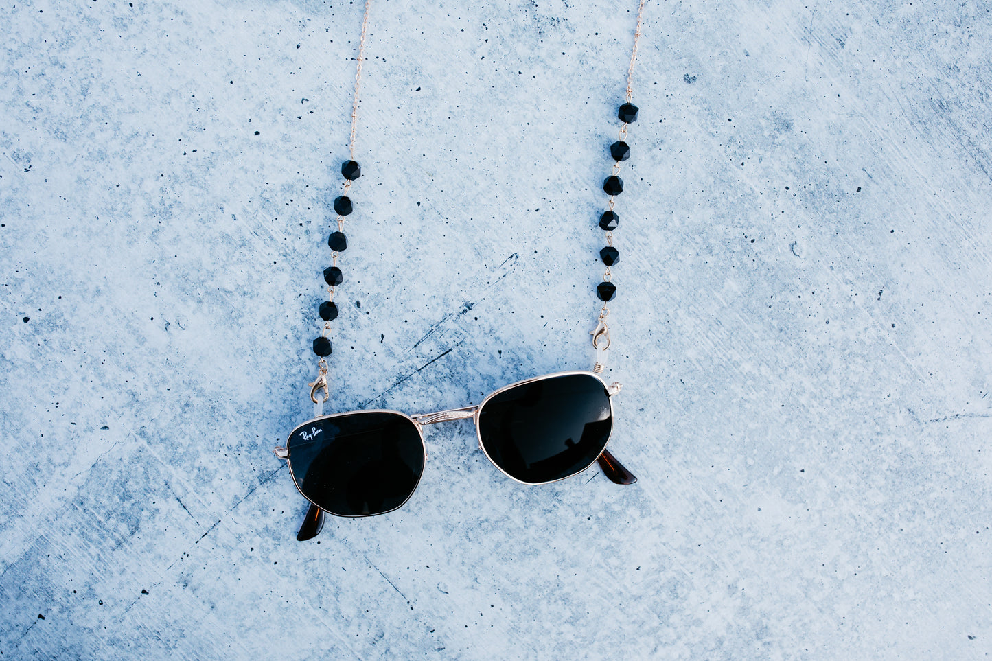 black and gold sunglasses chain