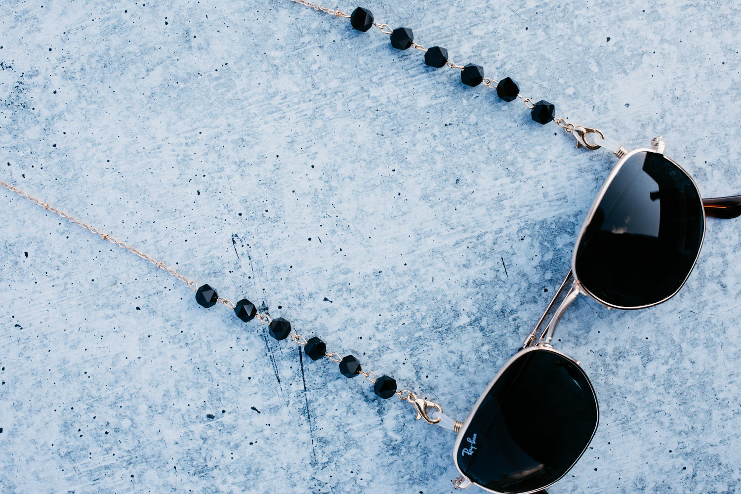 black and gold sunglasses chain