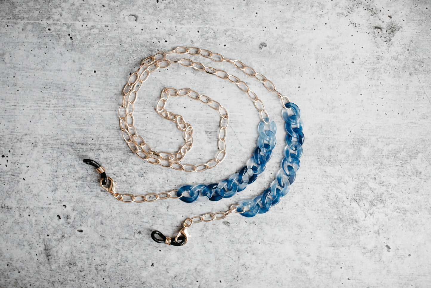 stylish light blue acrylic and gold sunglasses chain