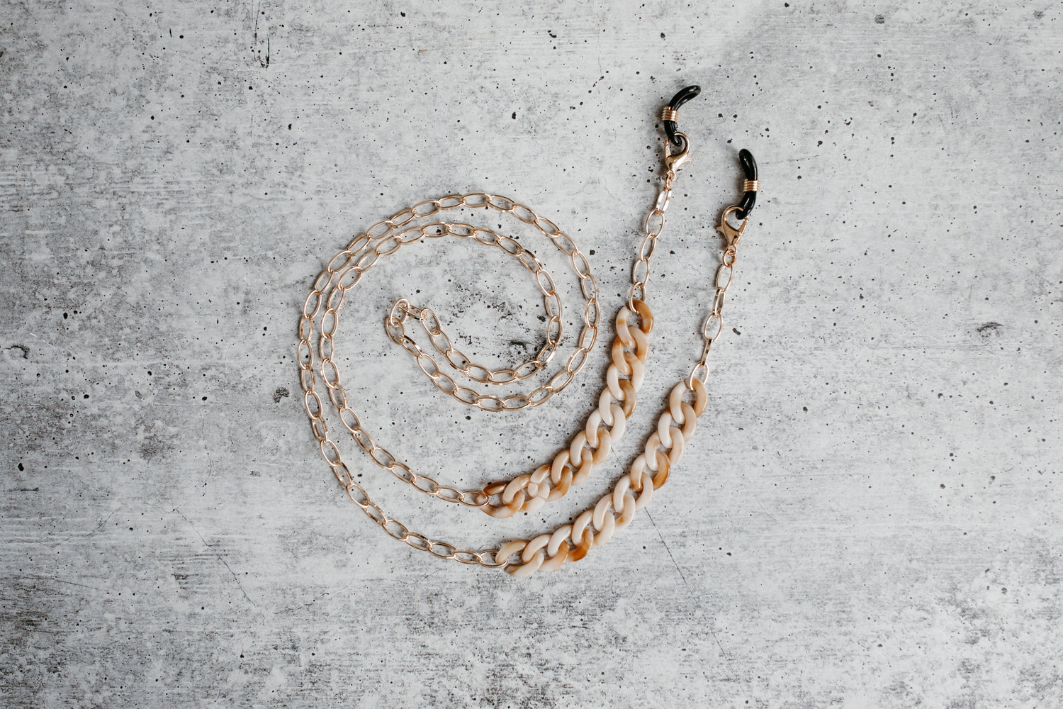 stylish tan neutral acrylic and gold sunglasses chain