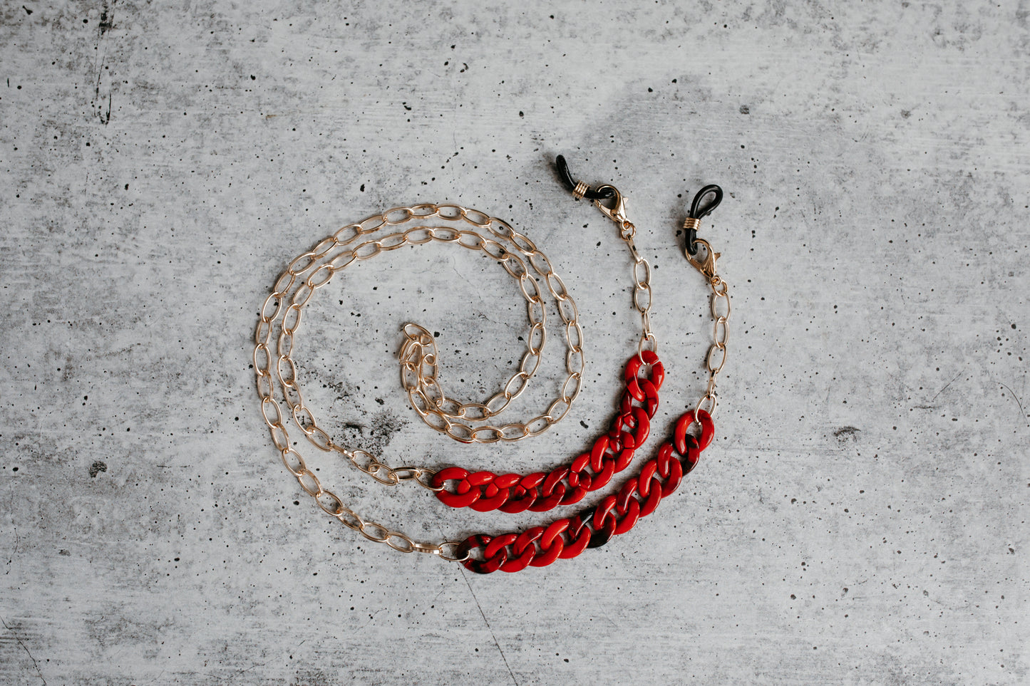 stylish red acrylic and gold sunglasses chain